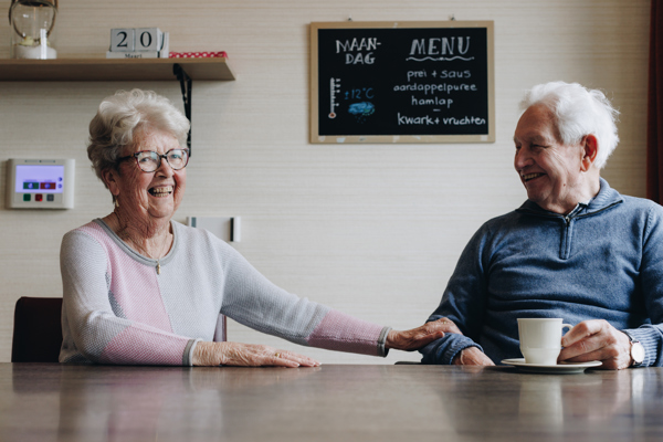 De Waterpoort Zorgpartners Bewoner Medewerker Mantelzorger Man Vrouw Lachen